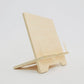 Birch plywood slot together book stand, standing sideways,  with dowels to hold pages open