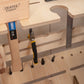 detail shot of birch plywood tool trolley tool storage cutouts containing mallet, drill heads , ruler & pliers.